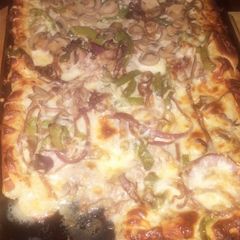 A picture of Philly cheese steak pizza.