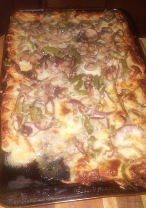A picture of Philly cheese steak pizza.