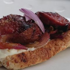 A picture of Sweet Sausage And Onion Sandwich.