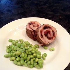 A picture of Pork, Bacon, Goat Cheese and Fig Roulade.