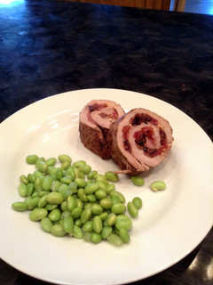 A picture of Pork, Bacon, Goat Cheese and Fig Roulade.