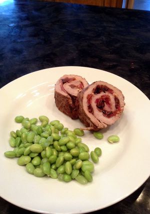 A picture of Pork, Bacon, Goat Cheese and Fig Roulade.