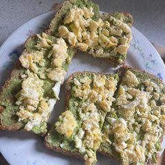A picture of Avocado on toast With scrambled eggs.