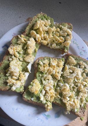 A picture of Avocado on toast With scrambled eggs.