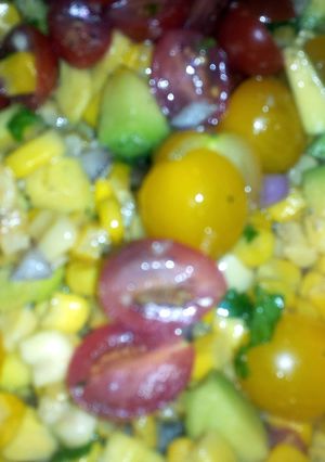 A picture of Corn, Tomatoe, and Avocado Salad.