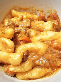 Una foto de Ñoquis de Carne y Crema con Tocino