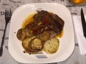 Una foto de bondiola de cerdo a la mostaza