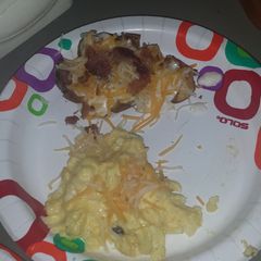 A picture of Smashed alfredo cheesy potatoes and eggs.