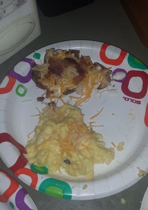 A picture of Smashed alfredo cheesy potatoes and eggs.