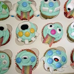 A picture of boys little monster cupcakes.