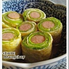 A picture of Rolled Cabbage with Fried Tofu and Wiener Sausages.