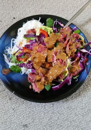 A picture of Zingy Coleslaw Satay with Rare Beef.