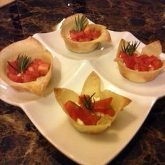 A picture of Goat cheese and tomato appetizer.