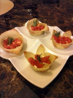 A picture of Goat cheese and tomato appetizer.