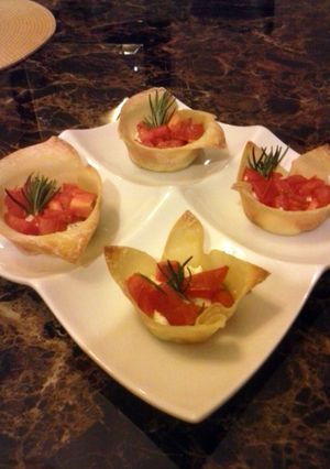A picture of Goat cheese and tomato appetizer.