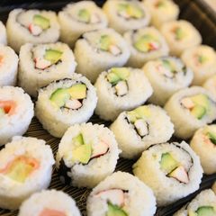 A picture of California Rolls with Salmon and Cream Cheese.