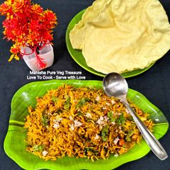 A picture of South Indian Sambar Powder Masala Peanut Rice - Tirupati Balaji Temple Prasadam.