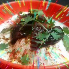 A picture of Bread Dahi Vada.
