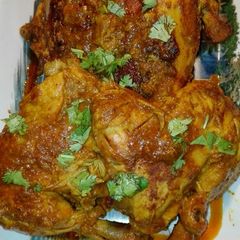 Mughlai Chicken Roast With Tomato Gravy A picture of Mughlai Chicken Roast With Tomato Gravy.