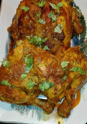 A picture of Mughlai Chicken Roast With Tomato Gravy.