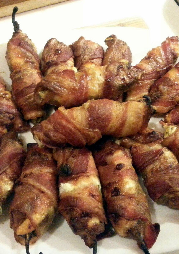 A picture of Beef and Cheese stuffed Jalapeños with Bacon.