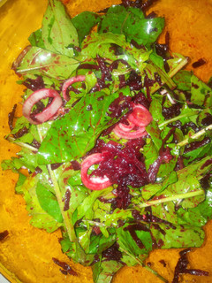 A picture of Beetroot arugula salad.