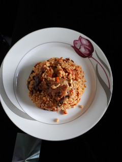 A picture of Jollof Bulgur wheat.