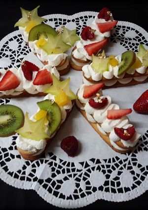 Une photo de Tartelettes fruits rouges et fruits exotiques
