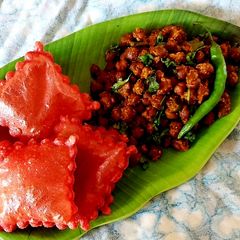 A picture of Kale Chane With Beetroot Puri.