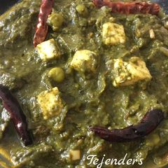 A picture of Palak matar paneer masala.