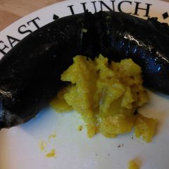 A picture of Traditional Bury Black Pudding with piccilli.