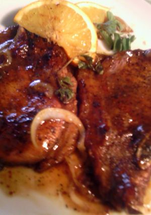 A picture of orange-glazed pork chops.