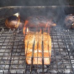 A picture of Grilled Salmon with Sweet Potato and Onion.