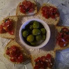 A picture of Tomato, garlic and basil bruschetta.