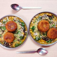 A picture of Ragda Aloo Tikki Chaat.