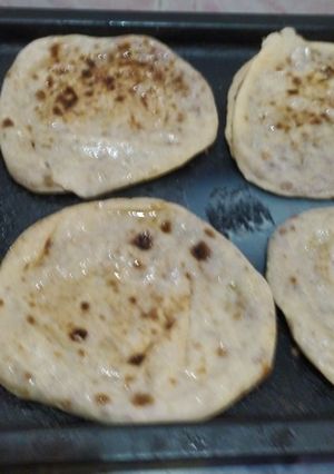 A picture of Hawawshi with Baladi or Whole Wheat Pita Bread.