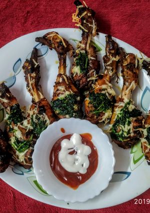 A picture of Baked chicken drumsticks.