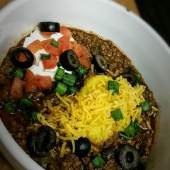 A picture of Crockpot Santa Fe Chili with Polenta Dumplings.