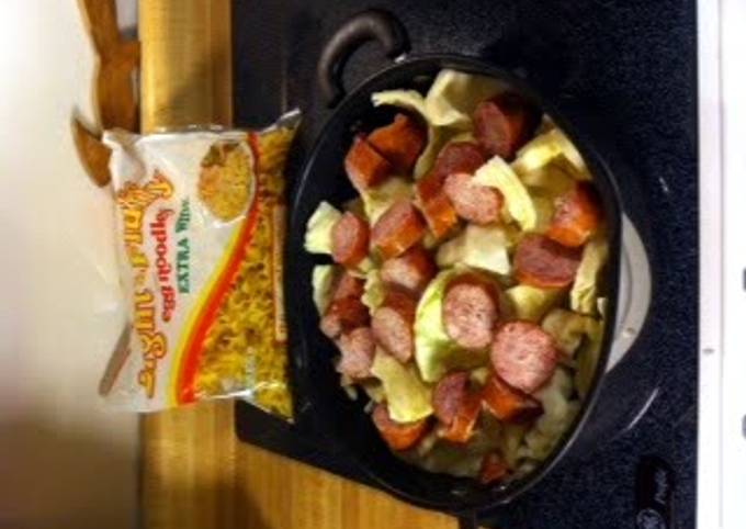 Fried cabbage and noodles with kielbasa