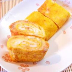 A picture of Tamagoyaki Japanese Omelettes with Salmon Flakes and Cheese.
