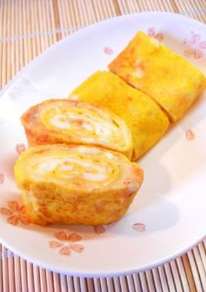 A picture of Tamagoyaki Japanese Omelettes with Salmon Flakes and Cheese.