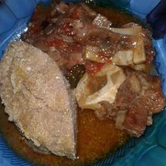 A picture of Beef with Brown Ugali.