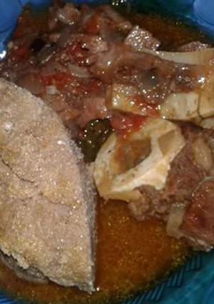 A picture of Beef with Brown Ugali.