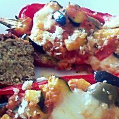 A picture of Sig's stuffed sweet peppers with vegetables and mozzarella.