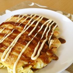 A picture of A Single Serving Okonomiyaki with Just Cabbage.
