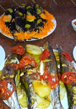 صورة لوصفة السمك البوري في الفرن ومشوي بالرده