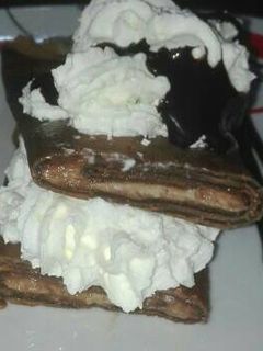 Una foto de Tortitas de chocolate rellena de Nocilla