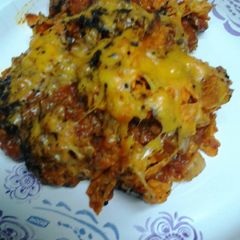 A picture of Doritos and chili casserole.
