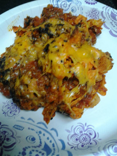 A picture of Doritos and chili casserole.