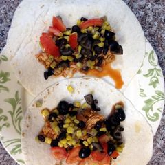 A picture of Salsa shredded chicken tacos.